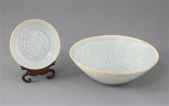 A Chinese Qingbai moulded dish and a bowl, Yuan dynasty (1271-1368), bowl with hairline cracks